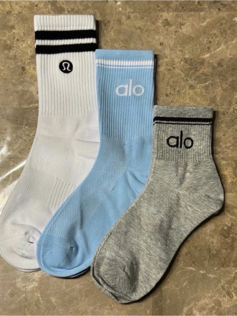 Lululemon and Alo socks Alo Packaging states size Large but they fit sizes 6-11